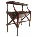 A mahogany bookstand, having a rectangular shelf with gadrooned border,