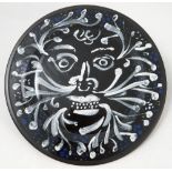 A Wedgwood limited edition black basalt plate, The Green Man by John Piper,