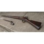 An Antique English flintlock musket, with proof marks to the barrel,