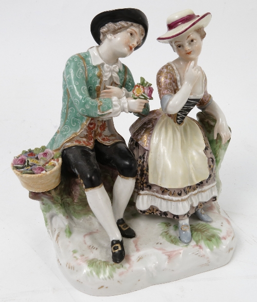 A late 19th/ early 20th century Meissen porcelain figure group, of a Gallant and his companion,