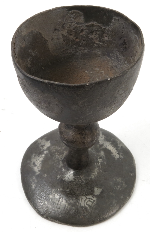 A pewter goblet, with knopped stem, engraved IHS to the base, height 5.