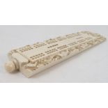 A 19th century Cantonese style carved ivory crib board, of sloping rectangular form,