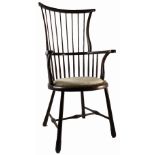 An Edwardian high comb back windsor armchair,