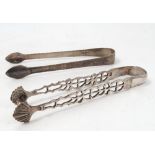 A Georgian silver pair of sugar tongs, with bright cut decoration, engraved with initials,