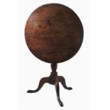 A yew wood tripod table,