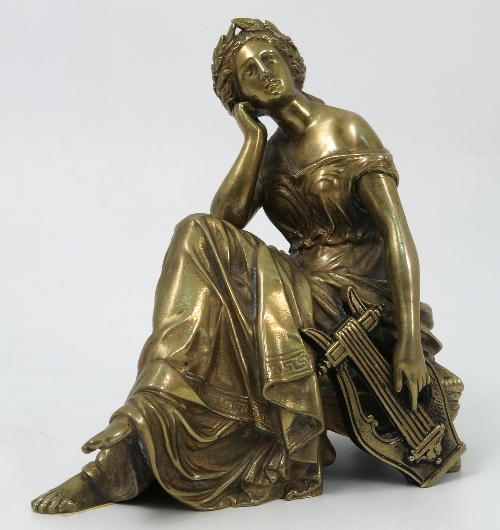 A gilt metal figure, of a seated classical female with lyre, signed Halcros?, height 5.