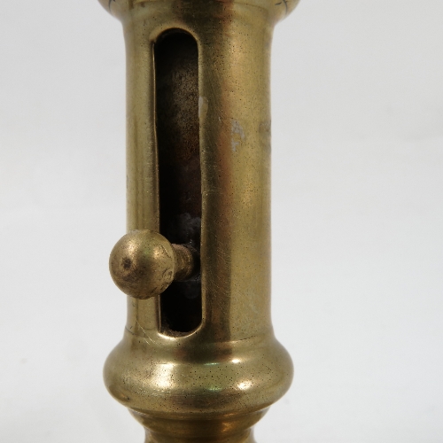 A pair of 19th century brass candlesticks, with ejector slide to the column, - Image 3 of 3