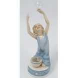 A Royal Worcester figure, Bubbles, modelled by F G Doughty, model number 3160, height 7.