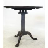 A Georgian mahogany circular occasional table, raised on a tripod base,