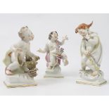 Three 20th century Messien figures, of a putti with a lobster,