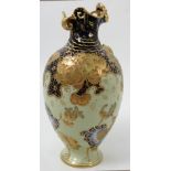 A Royal Crown Derby vase, with gilt shaped rim, decorated in blue, yellow and gilt with flowers,