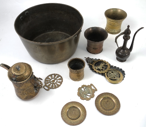 A collection of brass, to include two mortars, a jam pan,