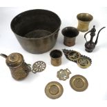 A collection of brass, to include two mortars, a jam pan,