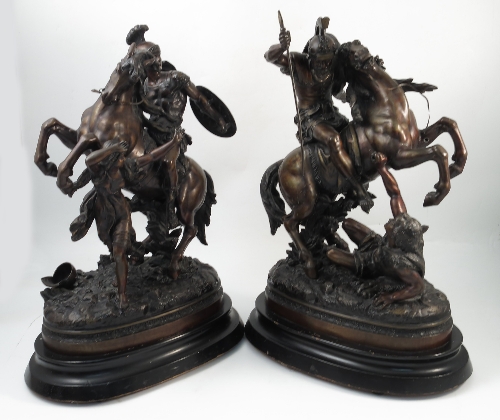 A pair of spelter Marley horses, inscribed to the back Moreau,