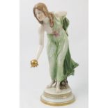 A Meissen figure, of a girl in green dress,