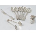 A set of four silver fiddle pattern dessert spoons, engraved with an initial, London 1845,