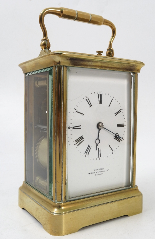 A brass repeating carriage clock,