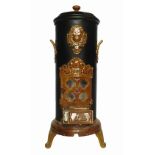 A cylindrical shaped Continental stove, marked W Faye A Juvisy Pre Paris,