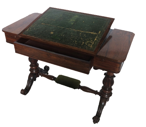 A 19th century rosewood writing table, with rising ratcheted lift up leather writing surface,