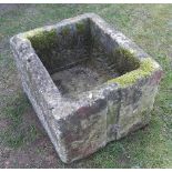 A rectangular stone pump trough 27ins x 22ins