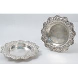 A pair of silver dishes, with shaped embossed edge, Sheffield 1903, weight 7oz,