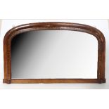 A 19th century walnut framed over mantel mirror, of D shape, with inlaid border, width 39.