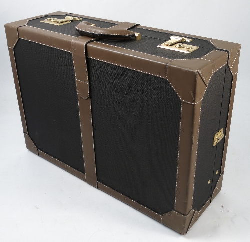 A Dunhill suitcase, with brown leather edging and strap, the interior with lift out tray,
