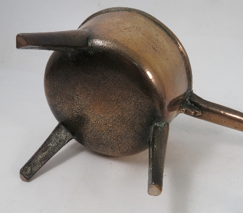 A bronze skillet, raised on three legs, diameter of bowl 7ins, together with a smaller example, - Image 2 of 3