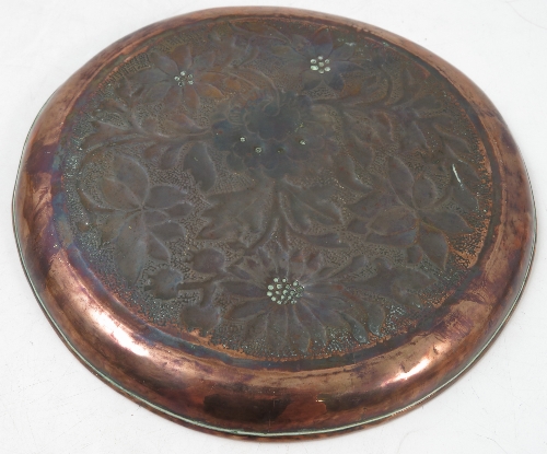 A Keswick School of Industrial Arts copper circular dish, embossed with flowers and leaves, - Image 2 of 2