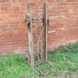 An iron and wooden sack truck, with hoist,