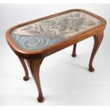 A Victorian mahogany framed bead work coffee table,