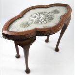 A Victorian walnut framed bead work coffee table,