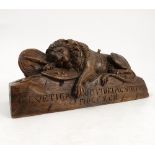 A 19th century carved wooden model, of the lion of Lucerne, with Latin inscription to the base,