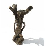 A driftwood stand, in a sculptural form,