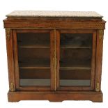A 19th century walnut pier cabinet, having two glazed doors with boxwood line inlay,