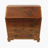 A 19th century mahogany bureau, the fall flap opening to reveal pigeon holes and drawers,