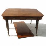 A 19th century mahogany dining table, formed as two D-ends, each with two drawers,