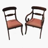 A set of five (4+1) Regency mahogany dining chairs, with part carved scroll backs,