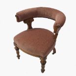 A late 19th century club chair, of horseshoe shape,