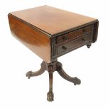 A 19th century mahogany Pembroke work table, fitted two drawers and two dummy drawers,