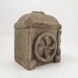 A stone ecclesiastical box, of rectangular form, with cross to the domed cover,