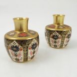 A pair of Royal Crown Derby vases, decorated in the 1128 Imari pattern, 1983, height 4.