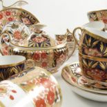 A 19th century Crown Derby tea set comprising two handled sugar bowl, milk jug,