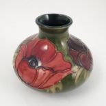 A Moorcroft pottery squat vase, decorated in the Anemone pattern,