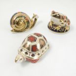 A Royal Crown Derby paperweight Tortoise, gold stopper, dated 1999,
