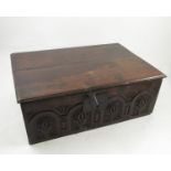 An early 19th century rectangle shaped bible box, with arcaded carved frieze to the front,