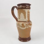 A Doulton Lambeth stoneware jug, slip decorated 'Welcome is the Best Cheer',