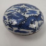 A Chinese small covered paste pot, probably 18th century, decorated with dragons,