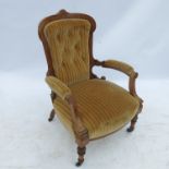 An Edwardian burr walnut show wood grandfather's chair