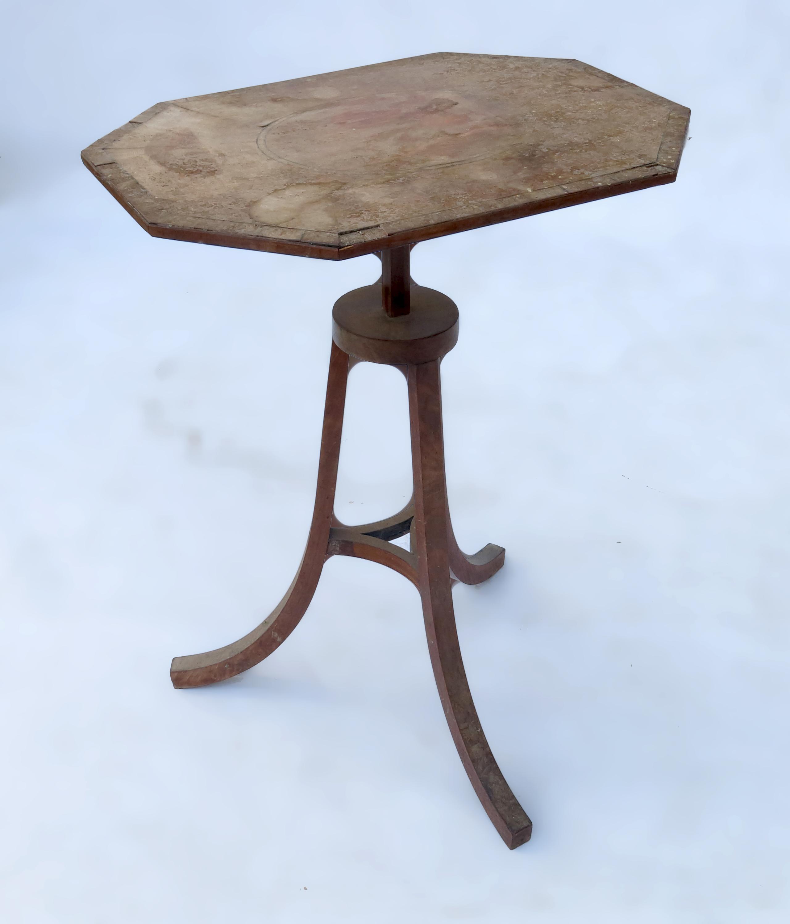 A unusual 18th century style octagonal shaped wine table, raised on a flare tripod base,